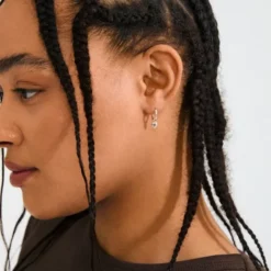 ALAIA earrings silver-plated