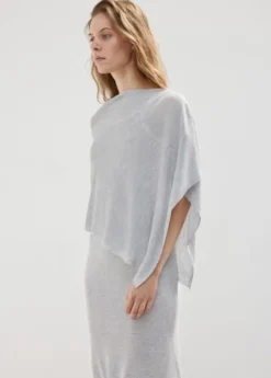 Asymmetrical knitted cape