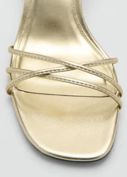 Heeled sandals with straps