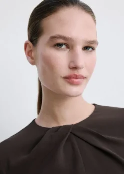 Long-sleeved dress with draped neck