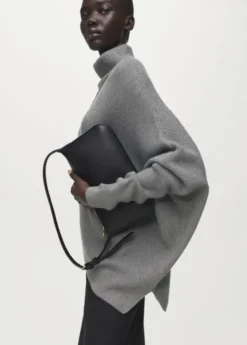 Sweater with asymmetrical roll neck