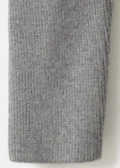 Sweater with asymmetrical roll neck