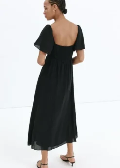 Textured dress with ruched detail