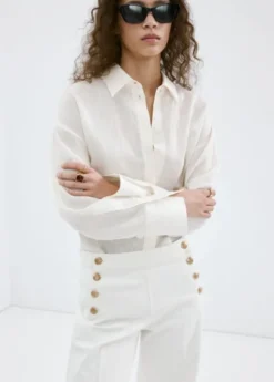 Wide-leg jeans with side buttons