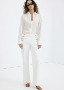 Wide-leg jeans with side buttons